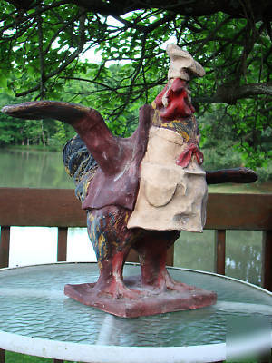 Rooster waiter server chef statue old restaur. display 