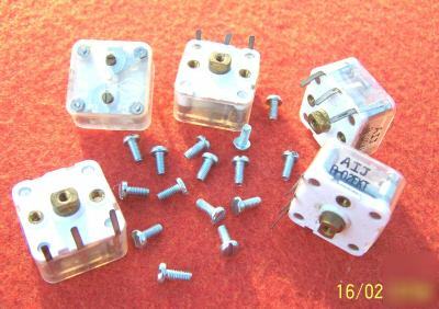 5 x polyvaricon capacitor with mounting screws.