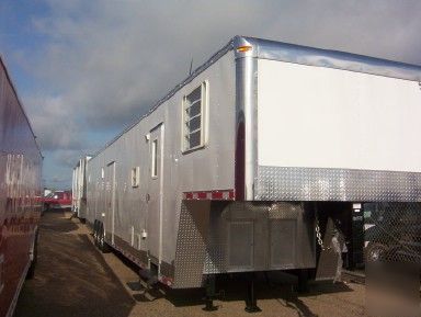 New enclosed trailer slide out living quarters 