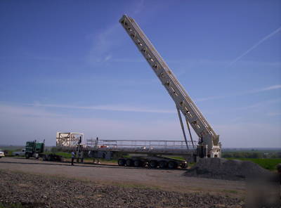 82' trailer 70'hyd. lift derek with self steering axle
