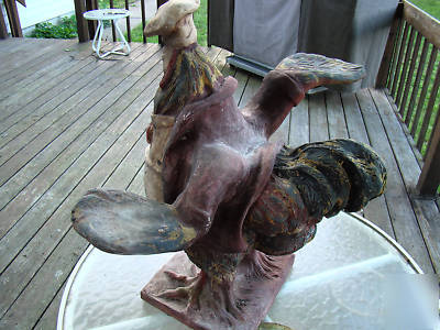 Rooster waiter server chef statue old restaur. display 