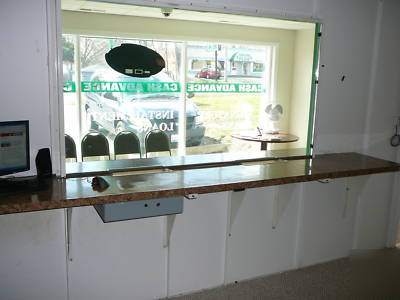 Bullet resistant security wall with window and door