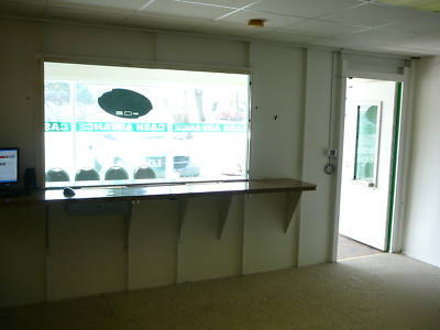 Bullet resistant security wall with window and door