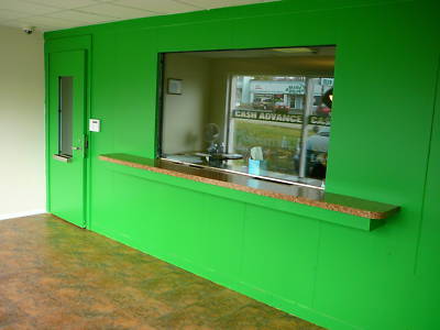 Bullet resistant security wall with window and door