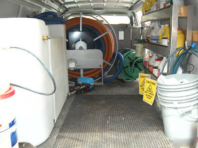 Carpet cleaning machine and ford E350 van