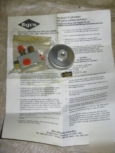 Bijur field replacement of flow control assembly