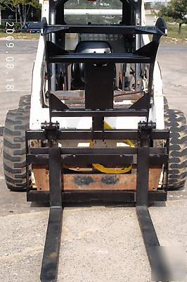 Pallet fork / log grapple skid steer attachment bobcat