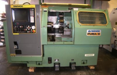 #puma 10 daewoo slant bed cnc lathe with tailstock '86