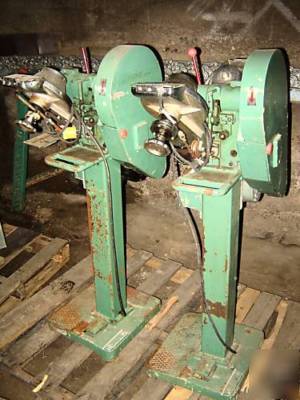 Pair of industrial automatic feed snap presses 