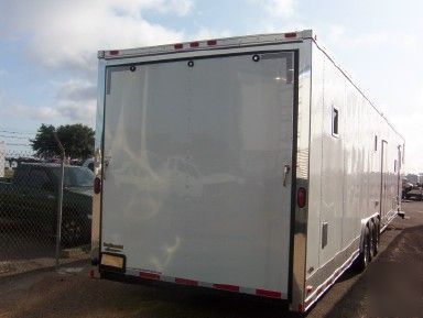 New enclosed trailer slide out living quarters 